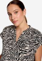 Schlupfbluse mit Zebraprint