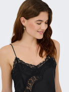 JDYFIFI S/L ASYM LACE SINGLET WVN NOOS