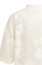 Durchsichtige Bluse im Häkelstil mit Blumenmuster