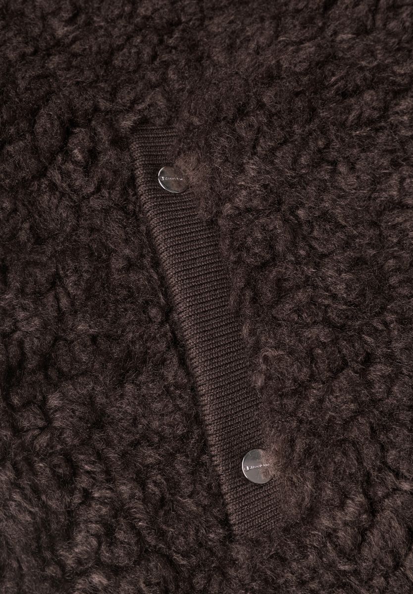 Fake Fur Weste mit Strickdetails
